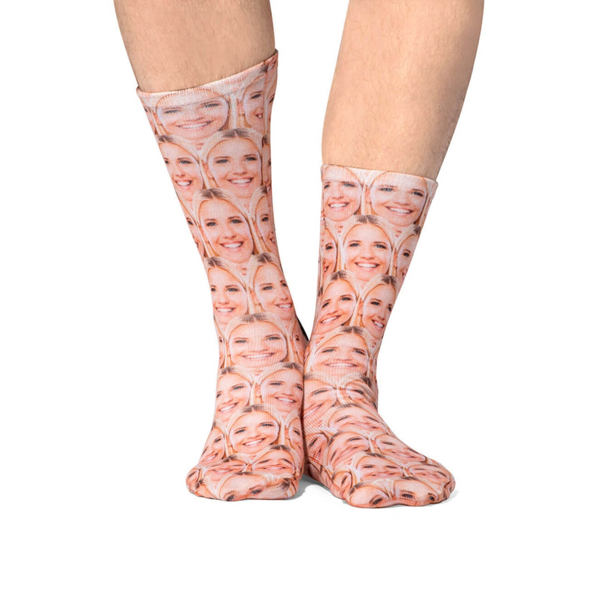 Socks with a pattern of faces on a white background