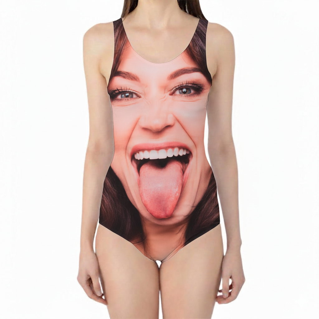 One-piece swimsuit with a printed face design on a white background