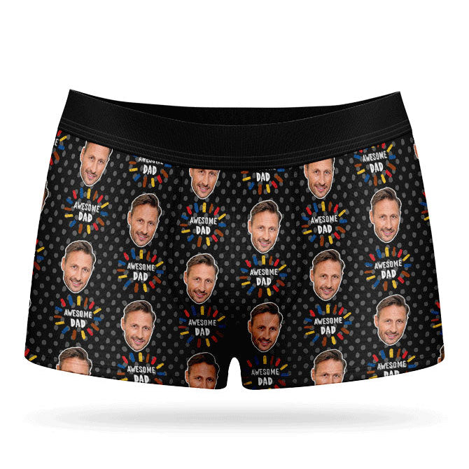 A pair of custom boxer briefs with a pattern of a person's face and text, presumably a personalized gift.
