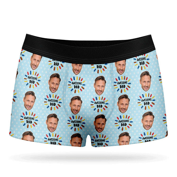A pair of custom boxer briefs with a pattern of a person's face and text, presumably a personalized gift.