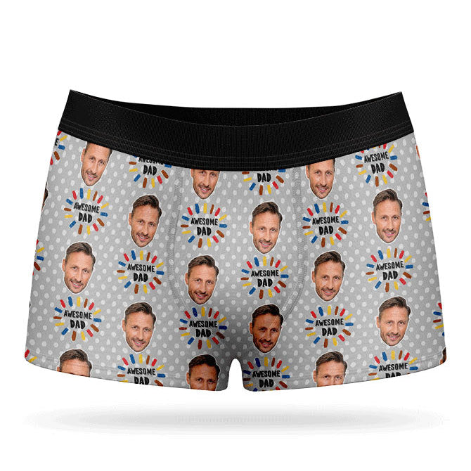 A pair of custom boxer briefs with a pattern of a person's face and text, presumably a personalized gift.