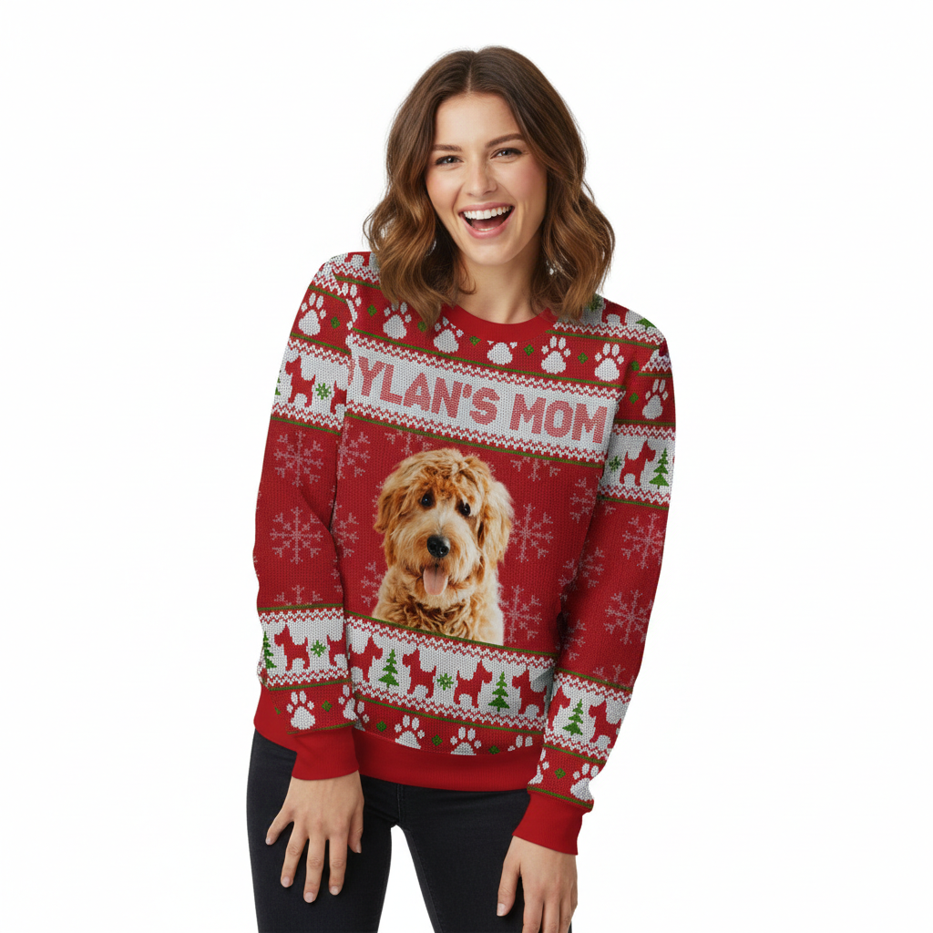 Woman wearing a red Christmas sweater with a dog's face and 'Ylan's Mom' text on a white background