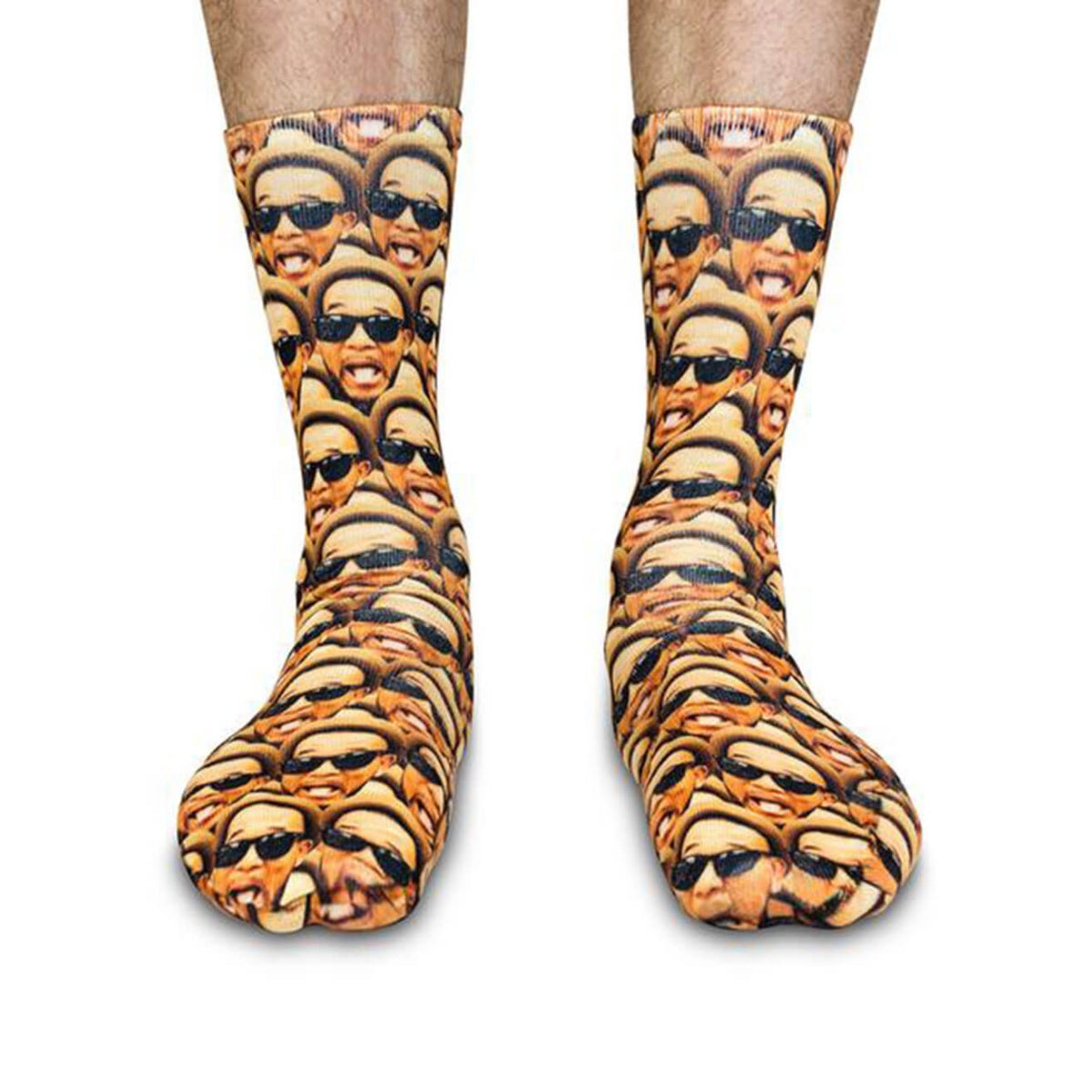 Socks with a pattern of a person's face wearing sunglasses on a white background