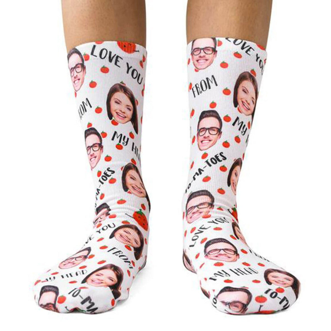 Socks with printed faces and text on a white background