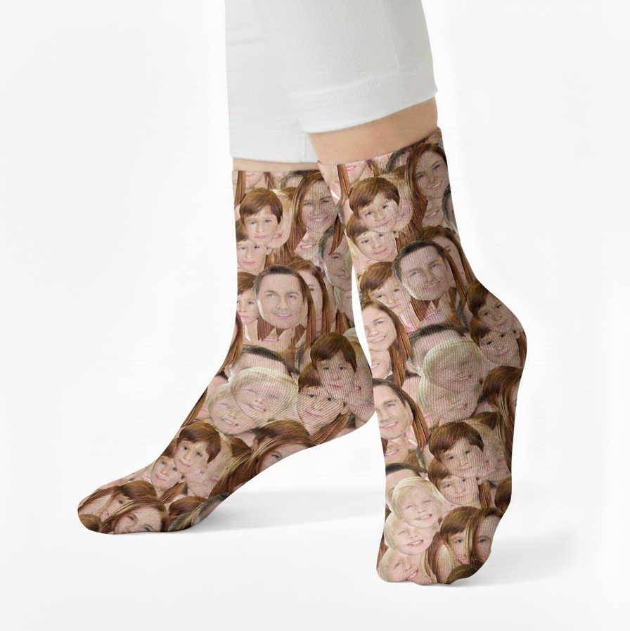 Person wearing socks with multiple images of a person's face on a white background